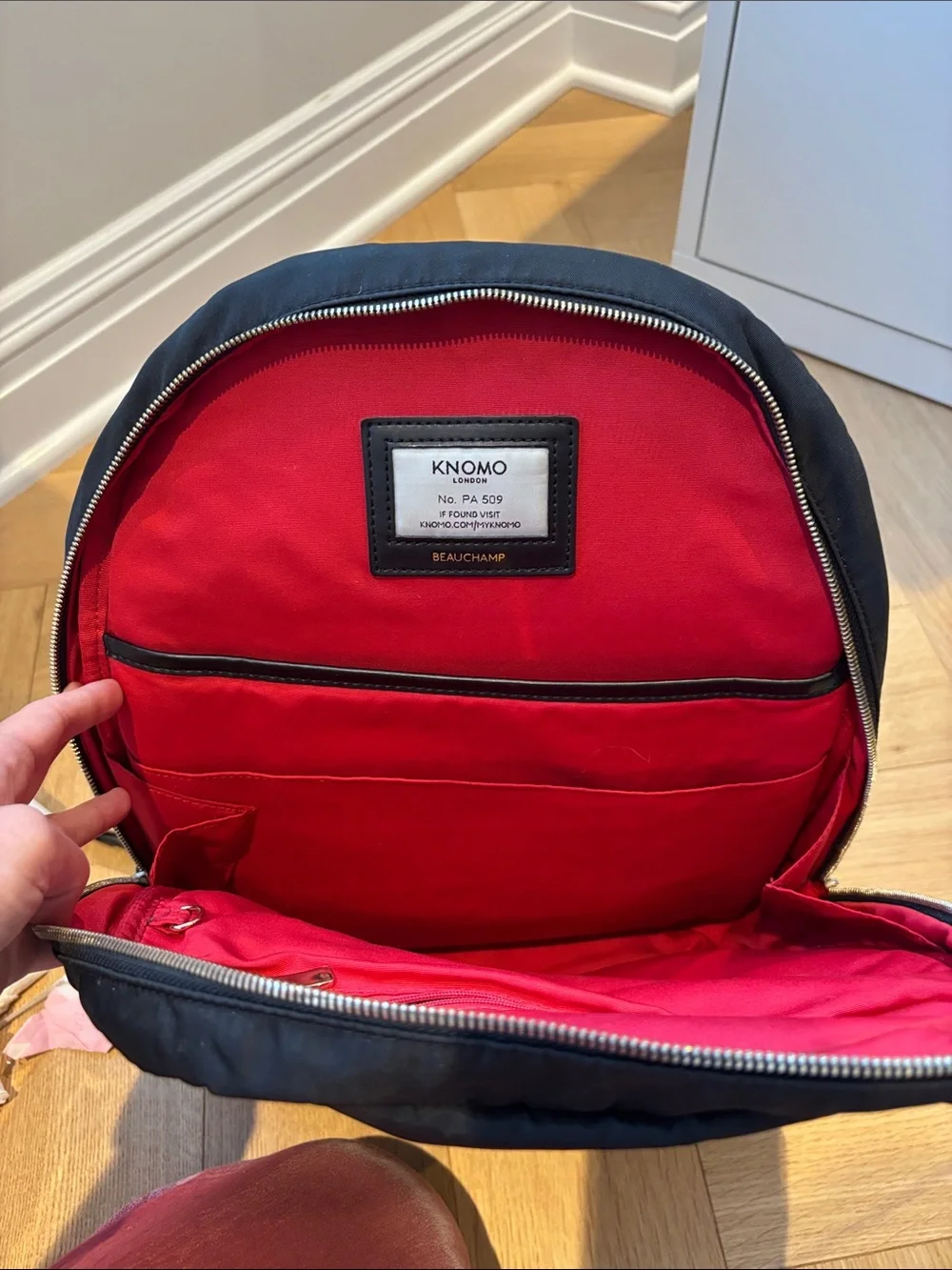 KNOMO Black Nylon Laptop Backpack with Front Zip Pocket